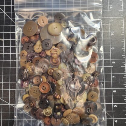 Mixed sized brown buttons, 3.5 ounce bag