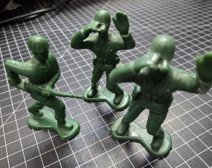 4 inch green army men. Plastic toys. Set of 3